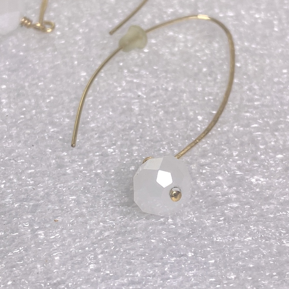 Unique semi hoop earrings with white beads